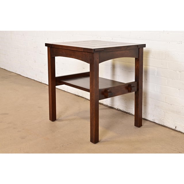 A beautiful Mission or Arts & Crafts quarter sawn oak occasional side table By Stickley USA, 2003 Measures: 24.5"W x...