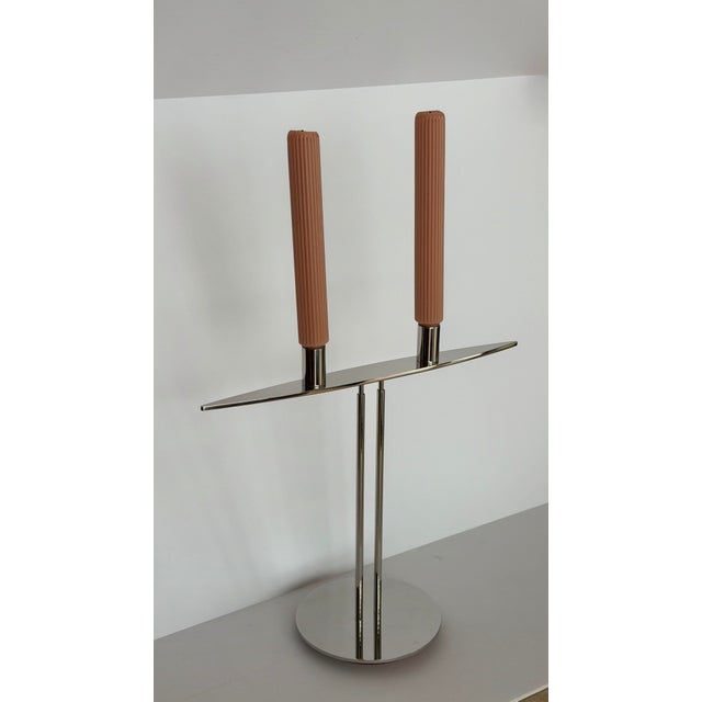 We are very pleased to offer this striking two-light candelabrum designed by celebrated German designer Peter Maly for...