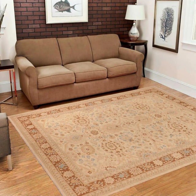 "Enhance the ambiance of your home with this magnificent Persian-influenced Turkish hand-knotted rug made by skilled...