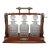 Circa 1895 English Tantalus Decanter Set - Set of 4 For Sale