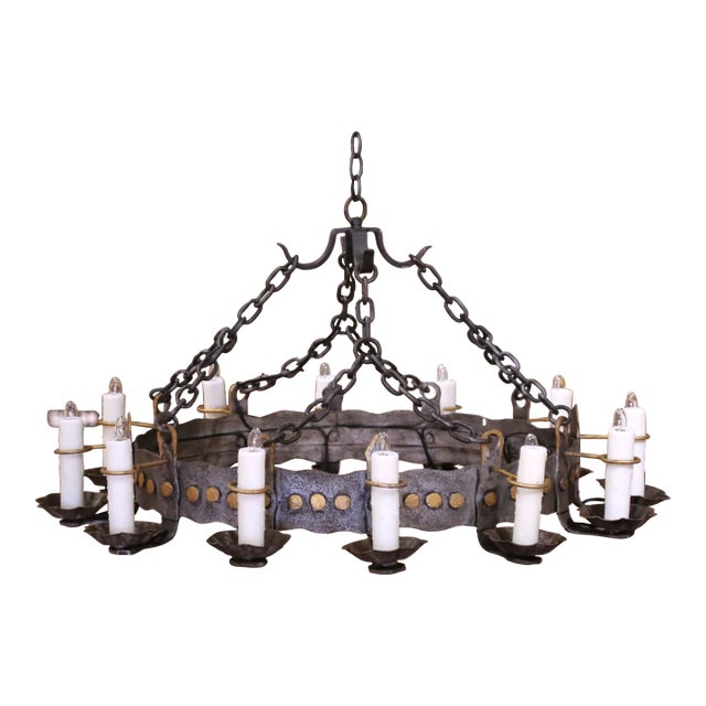 Early 20th Century French Gothic Twelve-Light Iron Chandelier With Gilt Accents For Sale