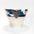 A fine French Art Deco vase or planter. By Camille Tharaud. In Limoges porcelain with underglaze decoration in blues,...