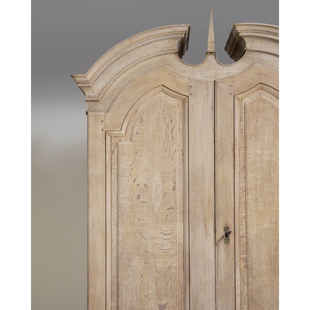 A refined cabinet rooted in Rococo design, featuring curved forms and balanced proportions. Early 19th century examples...
