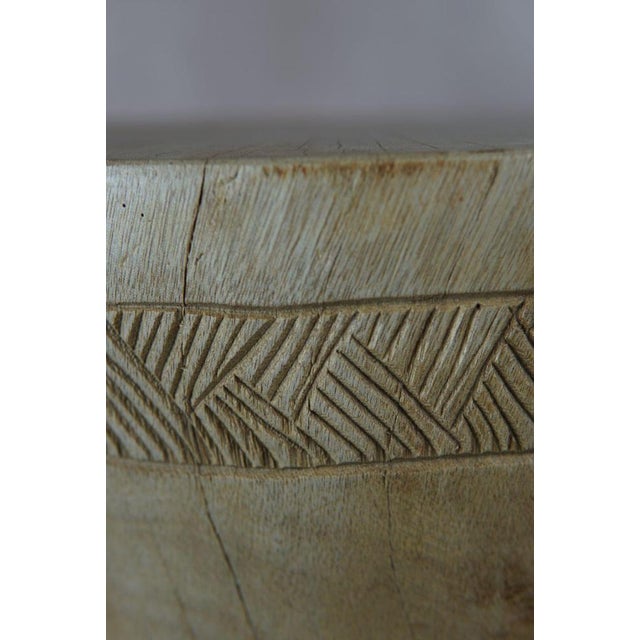 Introduce a touch of African elegance into your living space with this remarkable solid wood carved side table\.tool from...