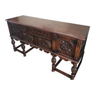 Early 20th Century Jacobean Style Carved Oak Sideboard For Sale