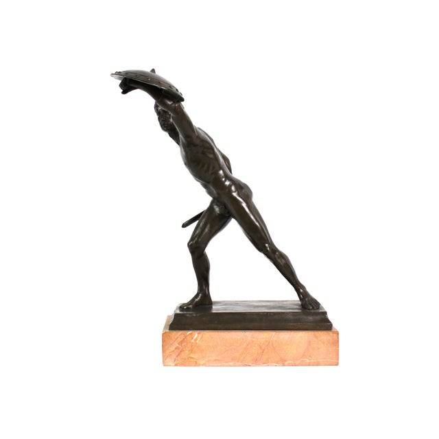 Eye-catching bronze sculpture by Jean Dider Debut (France, 1824-1893). Features a gladiator or soldier in a defensive...