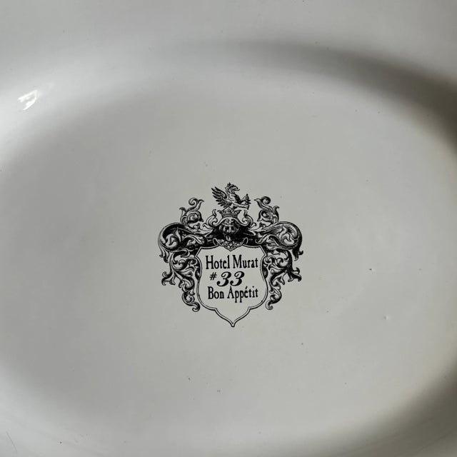Listing is for a white ceramic platter bearing the insignia of the Hotel Murat in Positano, Italy.