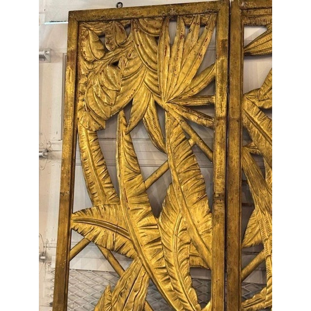 The product is a rare vintage Maison Jansen giltwood screen, adding a touch of elegance and sophistication to any room....