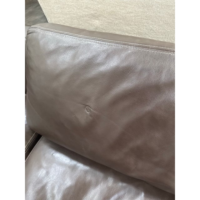 Design Plus Gallery presents a Leather Sectional with Chaise Lounge. This sectional has track arms, tufted back cushions,...