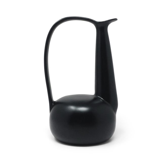 A swan-necked jug in black bucchero ceramic designed by Gio Ponti, produced by Costantino for the 1997 Neoponti...