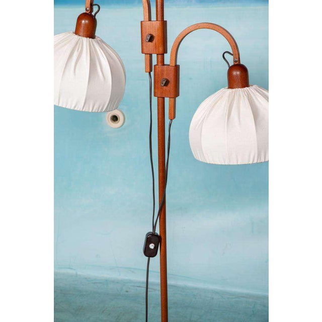 Very neat wooden floor lamp from the sixties - an elegant and functional addition to any interior. This floor lamp has two...
