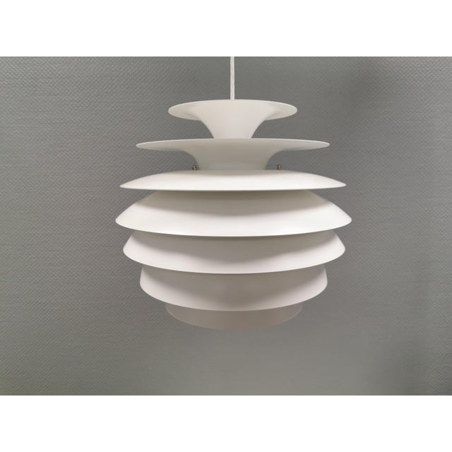 A very beautiful and original ‘barcelona’ hanging lamp, designed by bent karlby in denmark in the 1960s. the barcelona...