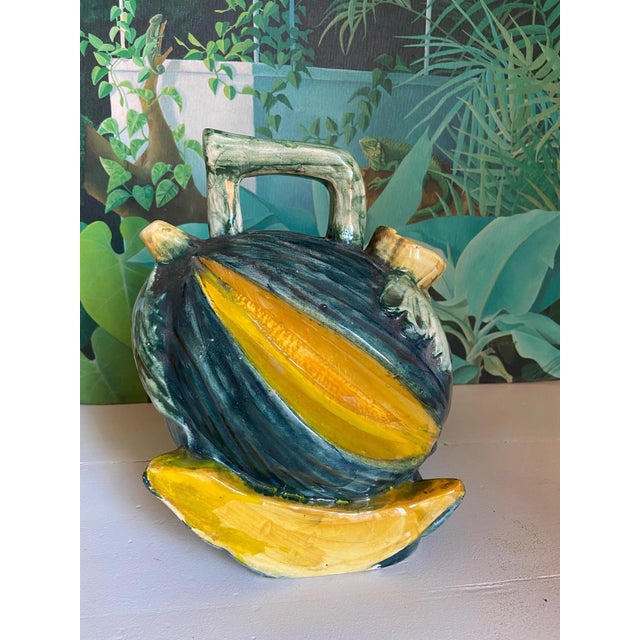 Hand-glazed Spanish gargoulette — traditional ceramic water pitchers from southern Spain — shaped as a cantaloupe melon...