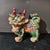 Enhance your home's Feng Shui and add a vibrant pop of color with this striking pair of Vintage Shiwan Ware Guardian...