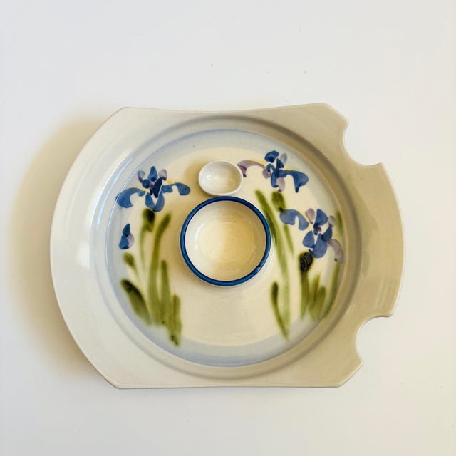 A vintage studio pottery serving plate with a lovely hand painted iris design. There are 2 attached bowls for sauces and...