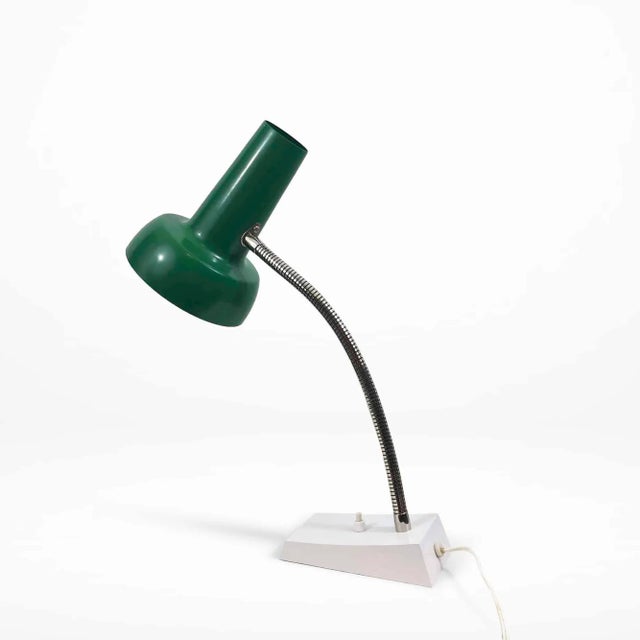 Desk lamp 'model 838' made by sis in germany. The metal lampshade is a deep green color. The flexible gooseneck is chrome...