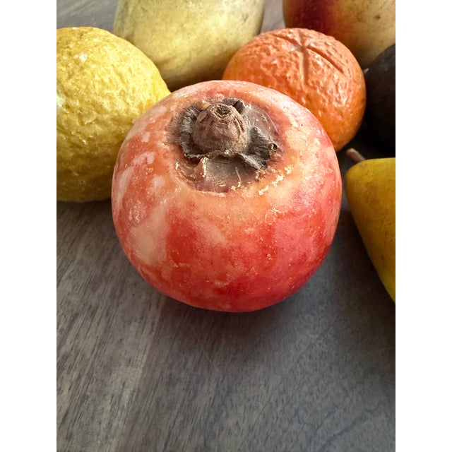 A stunning 11-piece collection of vintage mid-century Italian stone fruit, hand-carved from genuine Tuscan alabaster. This...