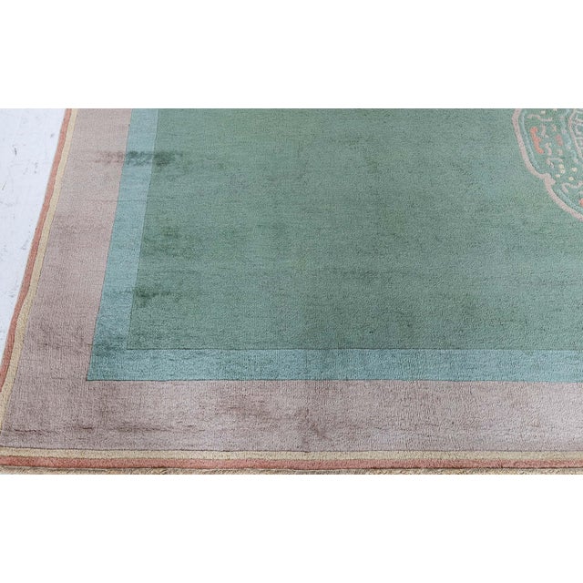 This vintage Chinese Art Deco rug beautifully embodies the refined simplicity and elegance characteristic of the Art Deco...