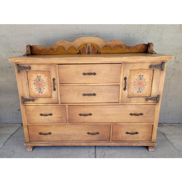 Exceptional California Rancho credenza with original hand painted panels and backsplash. Circa. 1930's. Often referred to...