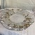 The item shown is a vintage embossed crystal platter made by IVV featuring a relief motif of pumpkins and detailed gold-...