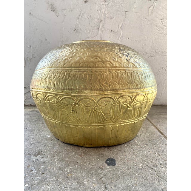 Gorgeous brass vessel - perfect for beautifully dried flora or any interior decor needs. Handmade in India with hammered...
