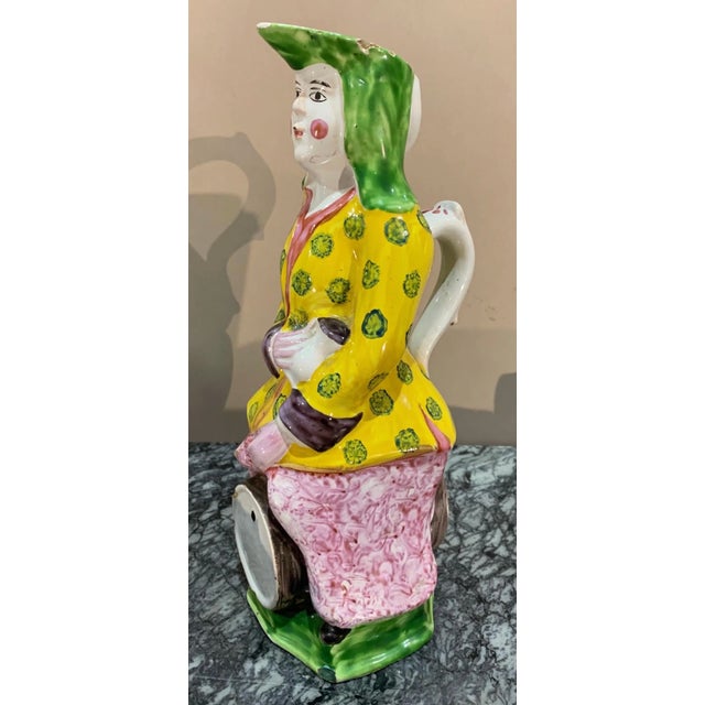 19th-century polychrome French faience wine decanter.