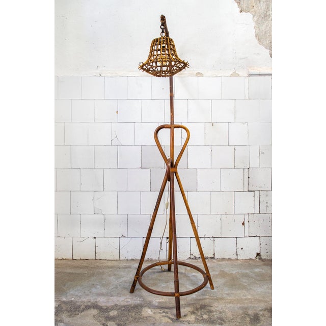 Rattan and bamboo floor lamp. Made in Italy 1950s European Plug (up to 250V).The wiring of this item may be original and...