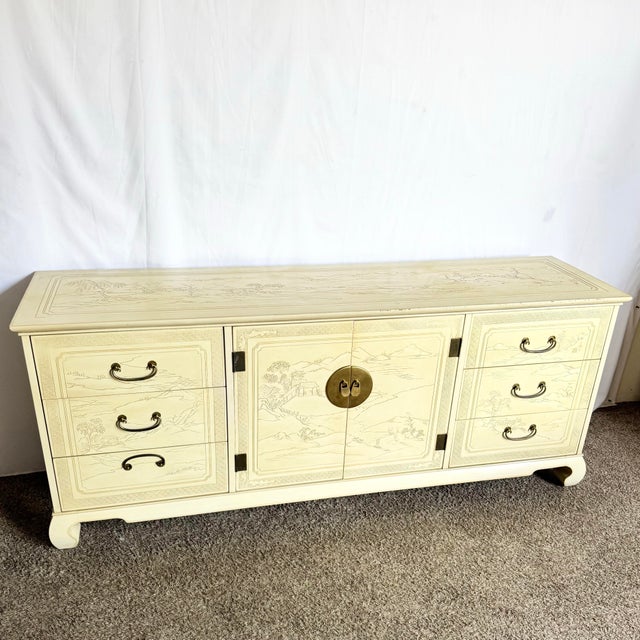 A stunning vintage Ming-style dresser and folding mirror by Drexel Heritage, showcasing classic Chinoiserie artistry in a...