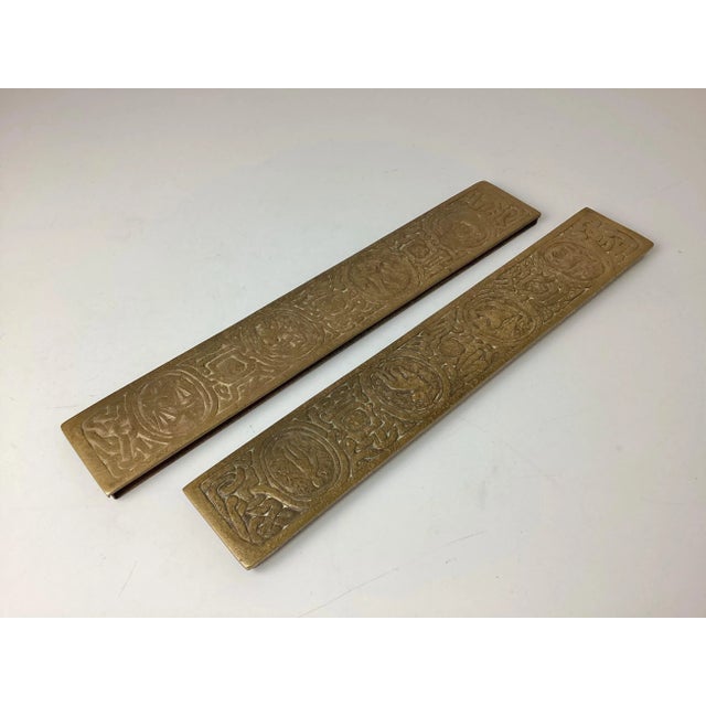 Pair Tiffany Studios Zodiac Pattern Blotter Ends in Bronze. Nice patina. Some age appropriate wear on bottom. Both marked...