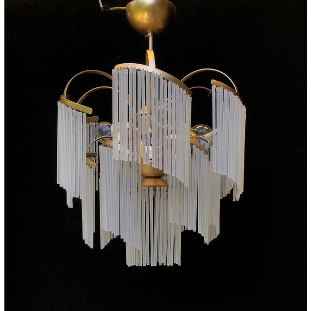 1980s Vintage Italian Murano Milk Glass Rod Tiered Chandelier A striking 1980s Italian vintage chandelier featuring...