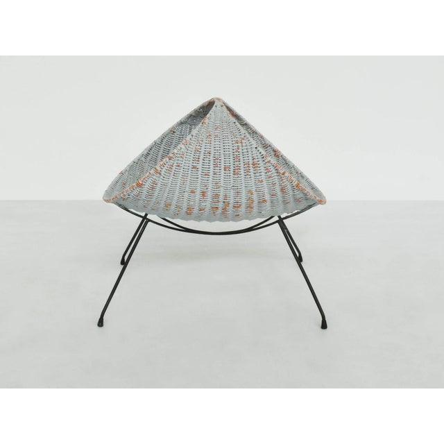 Oval Magazine Rack in Painted Woven Rattan by Campo e Graffi for Home Torino, Italy, 1956 I have official proof of...