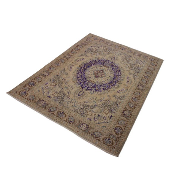 A mesmerizing addition to any décor, this brand-new hand knotted vintage distressed wool rug featuring vibrant colors and...