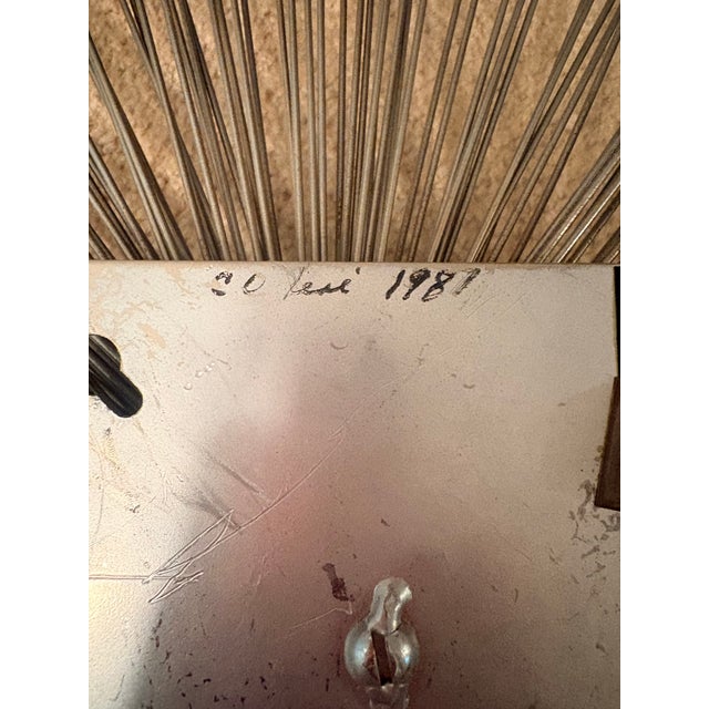 This was purchased by my mother when they bought their house back in the 1970’s. It has been hanging on the living room...