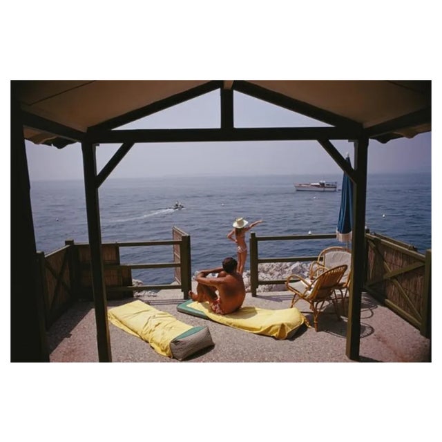 Slim Aarons, Beach Hut in Antibes, Estate Stamped Photographic Print, 1969 / 2020s For Sale