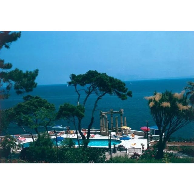 Taormina 1975 by Slim Aarons Slim Aarons Limited Estate Edition A swimming pool in Taormina, Sicily, 1975. unframed c type...