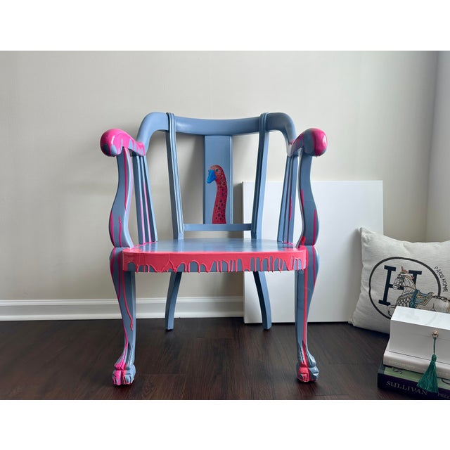 One of a kind hand painted accent chair refinished in a bold contemporary palette of soft blue and vibrant pink. This...