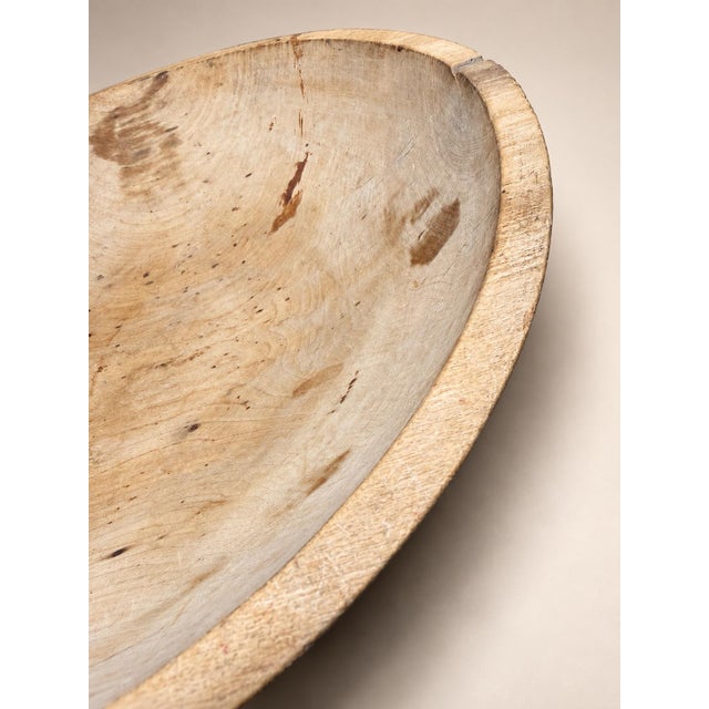 A wonderfully aged American turned-wood mixing bowl with the simple, substantial form associated with traditional...