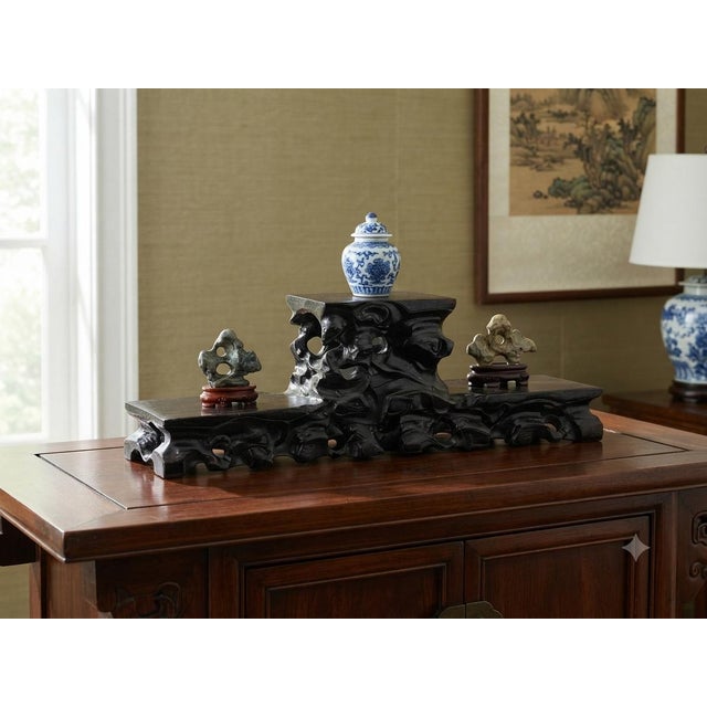 Elevate your collection with this exquisite vintage Chinese carved hardwood tiered display stand, expertly crafted to...