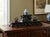 Elevate your collection with this exquisite vintage Chinese carved hardwood tiered display stand, expertly crafted to...