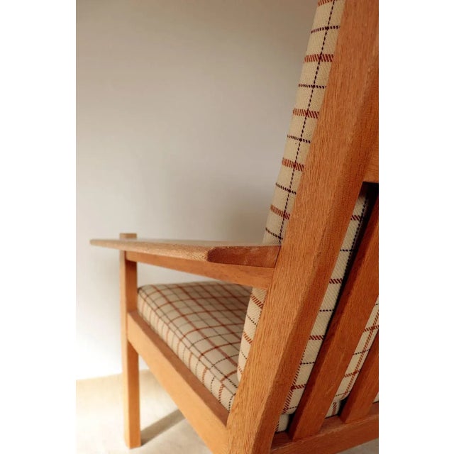 H680/690 Series Solid Oak Armchair & Stool Set by Bernt Petersen for Schiang, 1960s, in None conditions. Designed 1960 to...