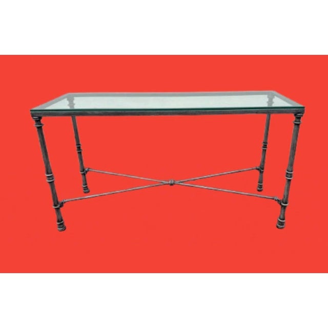 Vintage Giacometti style console table. A silver & black finish.