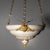 Large ceiling chandelier with alabaster bowl, pendant pinecone finial, and relief leaf decoration. The bowl is supported...