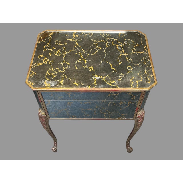 Hollywood Regency Mid Century Chinoiserie Mirrored Side Table Stand features faux marble motif on front, reverse and top...