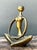 This captivating vintage sculpture depicts a stylized female figure in a state of serene meditation. Exemplifying the...