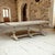 A substantial Italian trestle table crafted in solid oak, presenting a strong architectural presence balanced by rustic...