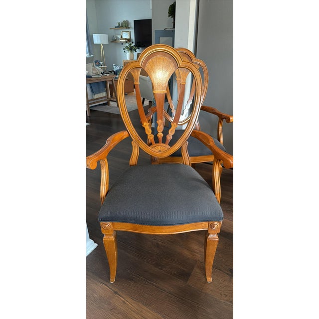 SET OF FOUR VINTAGE UNIVERSAL FURNITURE CARVED WOOD ARMCHAIRS Asking Price: $795 for the set Bring timeless traditional...