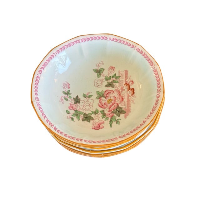 A charming set of seven vintage Adams Calyx Ware Metz coupe cereal bowls, made in England. The Metz pattern combines a...