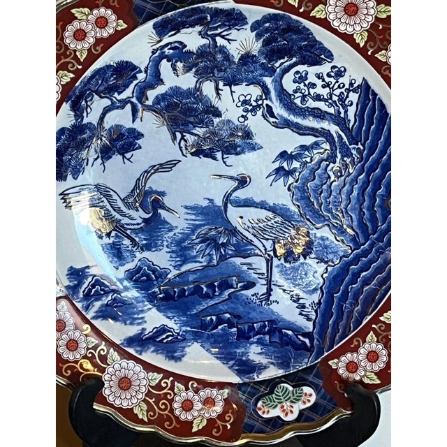 Elevate your space with this stunning 16.5-inch vintage Japanese charger. This large, decorative plate features a classic,...