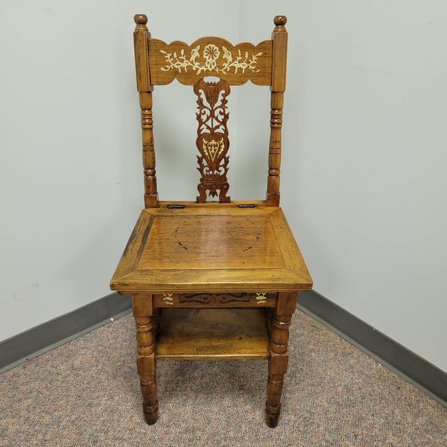A wonderful metamorphic chair that converts to a ladder when flipped open. The frame is ash hardwood with the back splat...