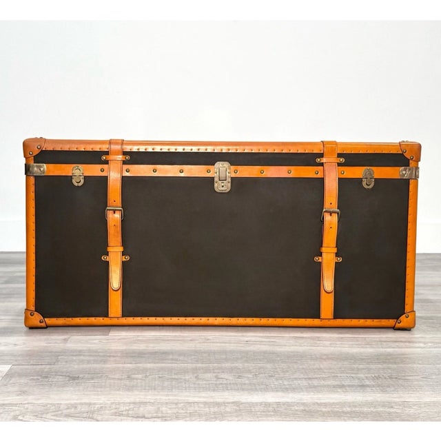 In excellent vintage condition. Brass bindings have some patina. This iconic piece is a rare find. With a rich Espresso...